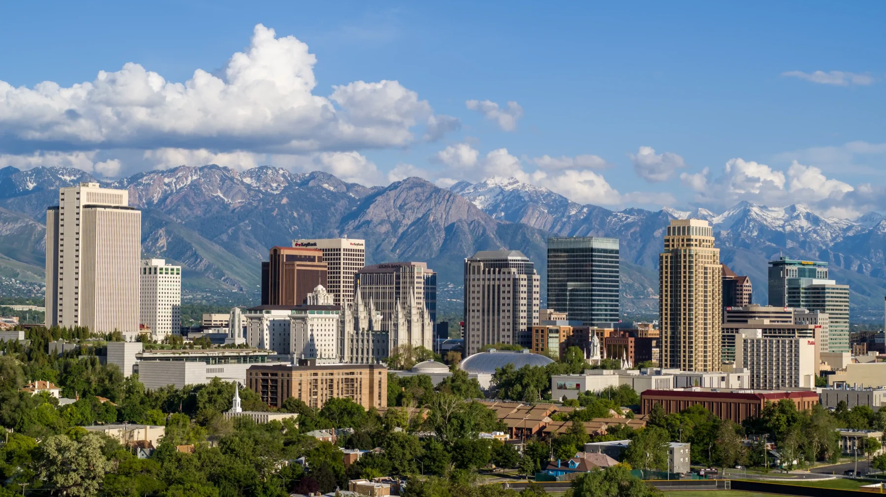 Salt Lake City Utah skyline, tall buildings with mountains in the distance